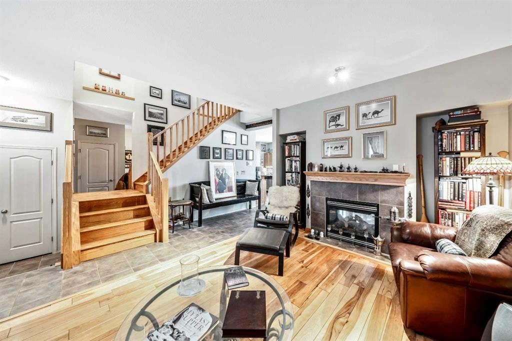 40 Mckinnon Street Nw, Langdon, AB - Indoor Photo Showing Living Room With Fireplace