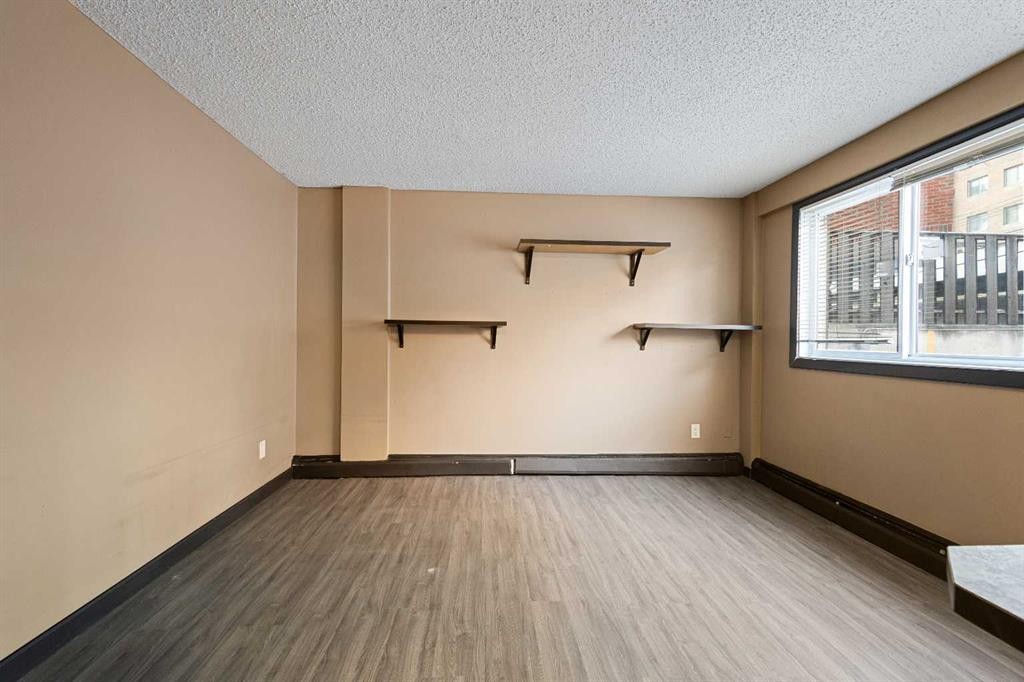 105-620 15 Avenue Sw, Calgary, AB - Indoor Photo Showing Other Room