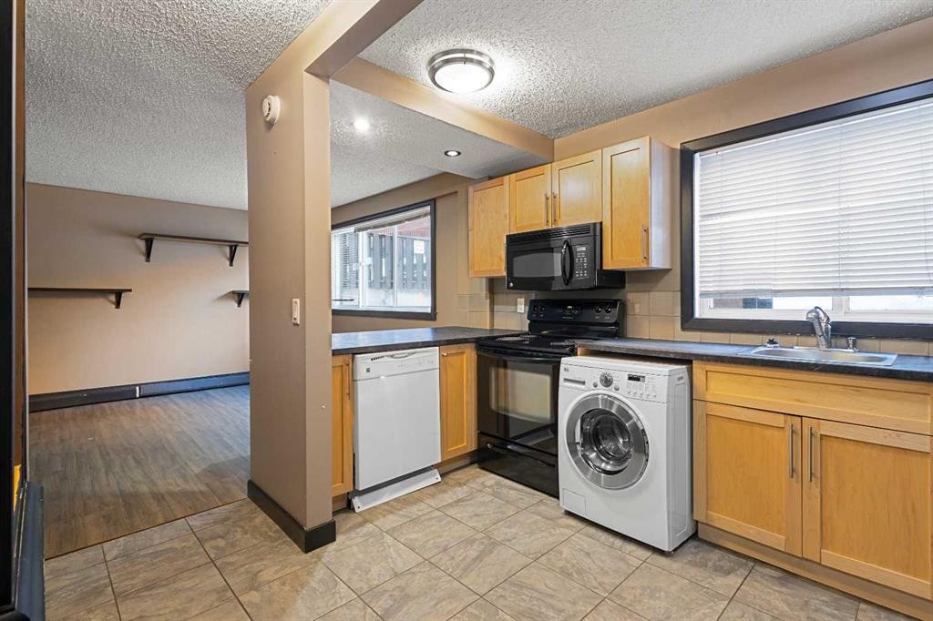 105-620 15 Avenue Sw, Calgary, AB - Indoor Photo Showing Laundry Room