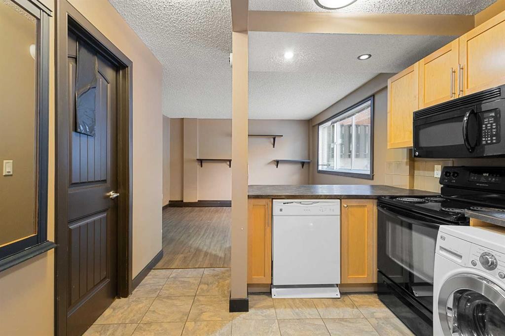 105-620 15 Avenue Sw, Calgary, AB - Indoor Photo Showing Laundry Room