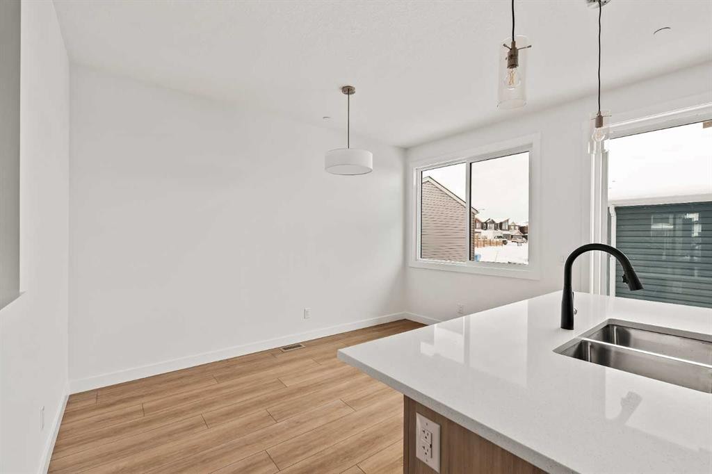 15 Herron Walk Ne, Calgary, AB - Indoor Photo Showing Kitchen With Double Sink