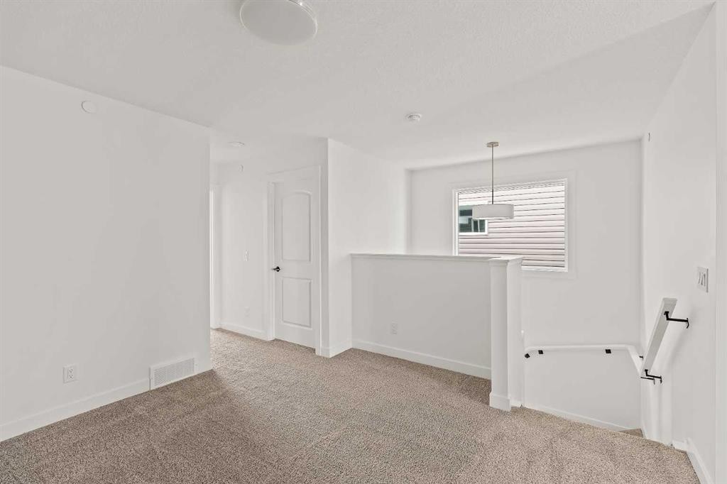 15 Herron Walk Ne, Calgary, AB - Indoor Photo Showing Other Room