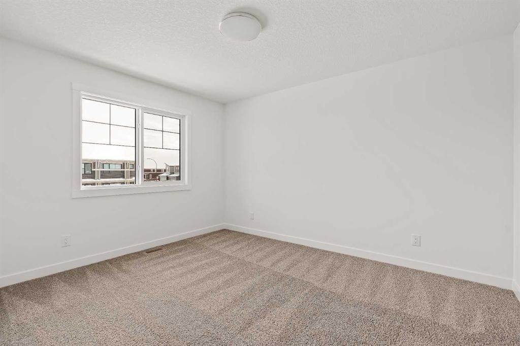 15 Herron Walk Ne, Calgary, AB - Indoor Photo Showing Other Room