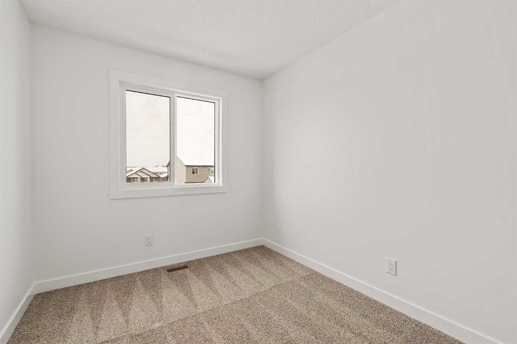 15 Herron Walk Ne, Calgary, AB - Indoor Photo Showing Other Room