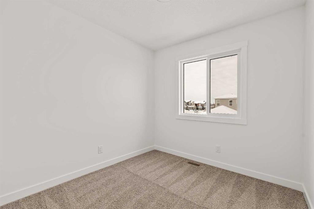 15 Herron Walk Ne, Calgary, AB - Indoor Photo Showing Other Room