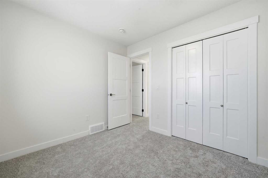 1923 Mccaskill Drive, Crossfield, AB - Indoor Photo Showing Other Room