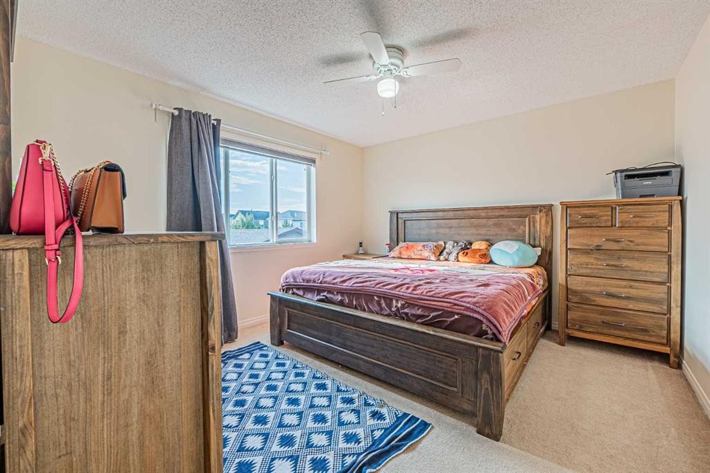 9249 Saddlebrook Drive Ne, Calgary, AB - Indoor Photo Showing Bedroom