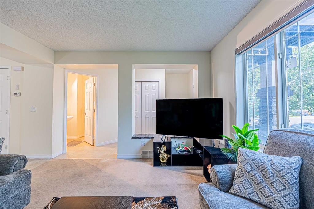 9249 Saddlebrook Drive Ne, Calgary, AB - Indoor Photo Showing Living Room