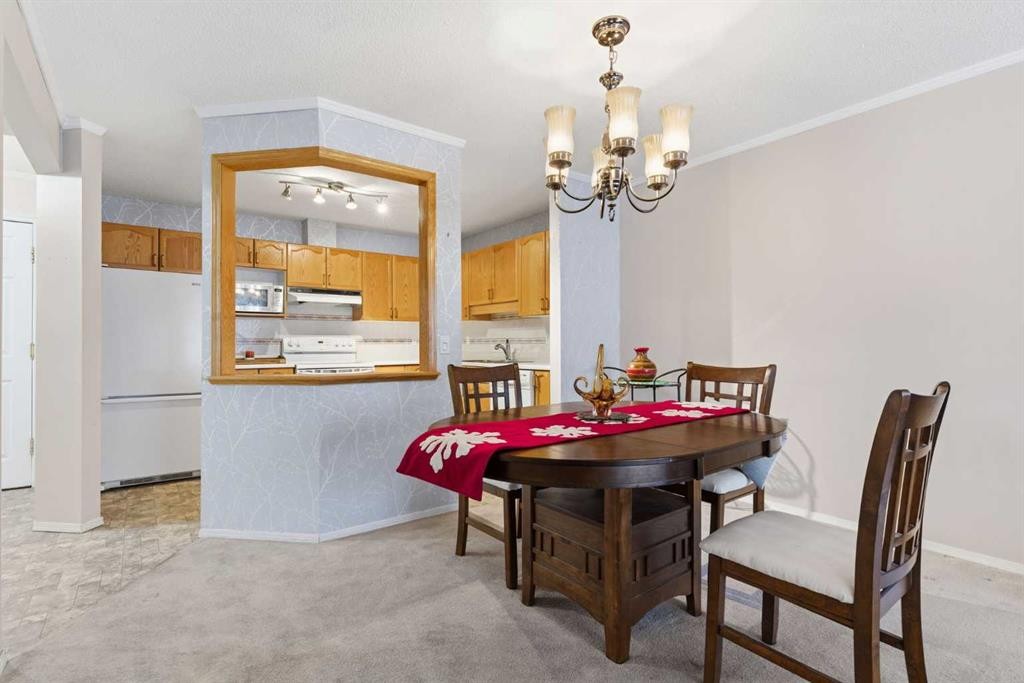 1209-1209 Sienna Park Green Sw, Calgary, AB - Indoor Photo Showing Dining Room
