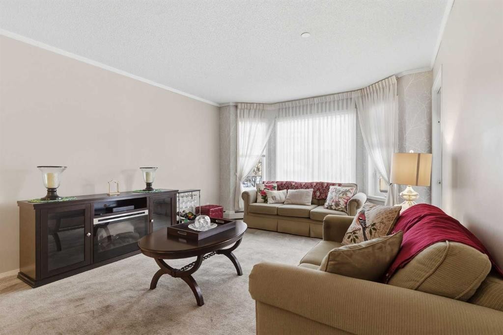 1209-1209 Sienna Park Green Sw, Calgary, AB - Indoor Photo Showing Living Room