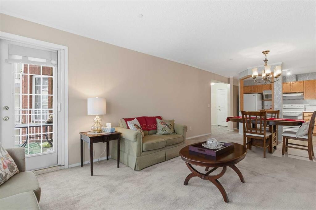 1209-1209 Sienna Park Green Sw, Calgary, AB - Indoor Photo Showing Living Room