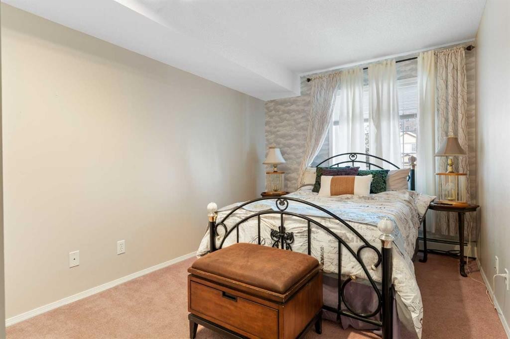 1209-1209 Sienna Park Green Sw, Calgary, AB - Indoor Photo Showing Bedroom