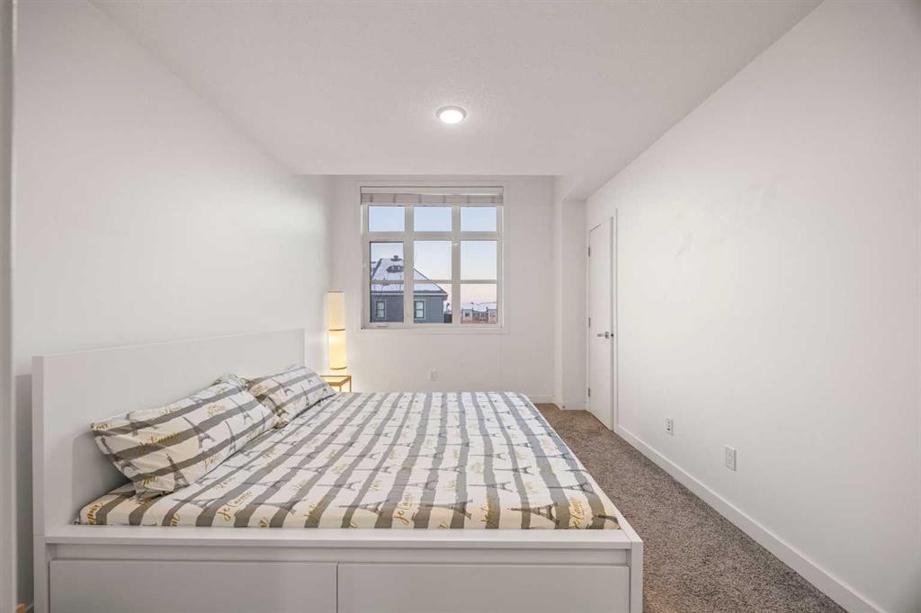87 Walden Path Se, Calgary, AB - Indoor Photo Showing Bedroom