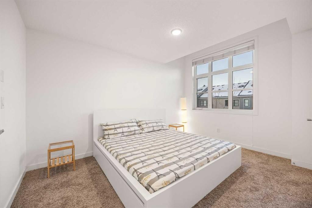 87 Walden Path Se, Calgary, AB - Indoor Photo Showing Bedroom