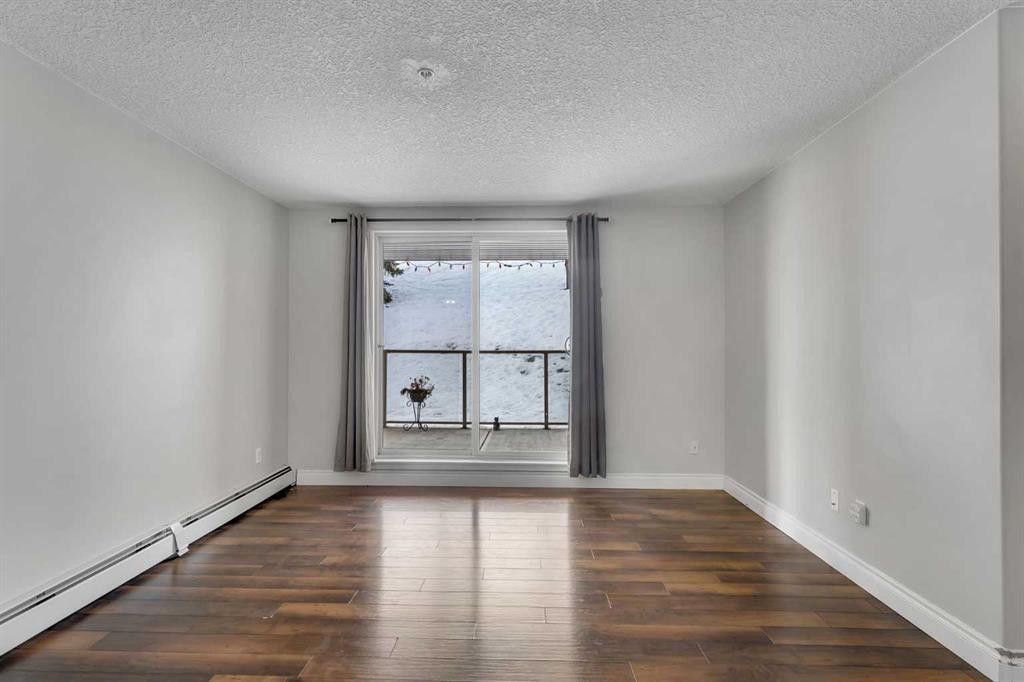 106-5500 Somervale Court Sw, Calgary, AB - Indoor Photo Showing Other Room