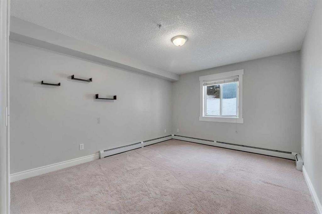106-5500 Somervale Court Sw, Calgary, AB - Indoor Photo Showing Other Room