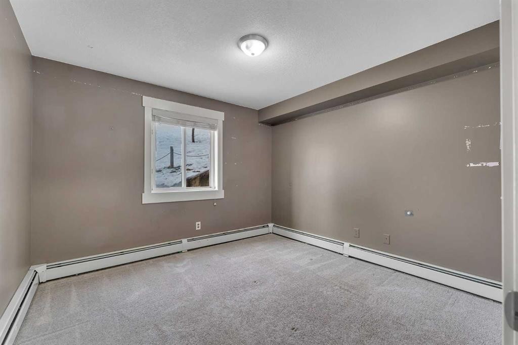 106-5500 Somervale Court Sw, Calgary, AB - Indoor Photo Showing Other Room