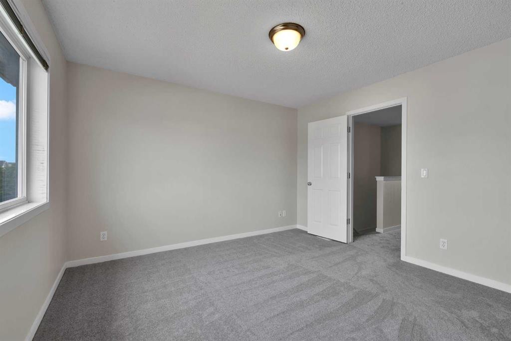 203 Cranberry Green Se, Calgary, AB - Indoor Photo Showing Other Room