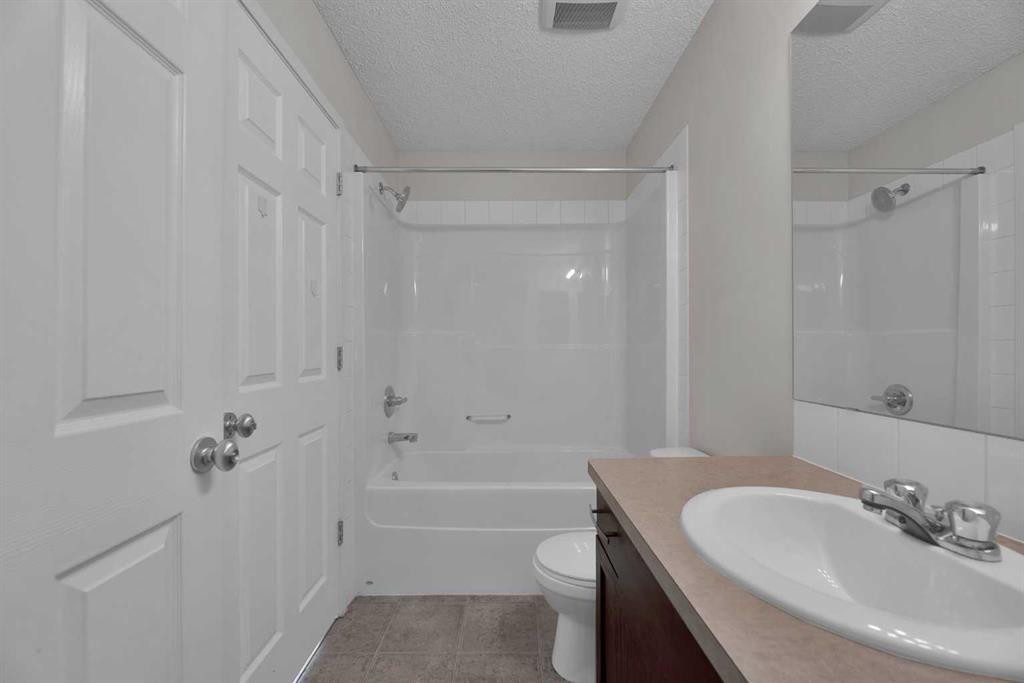 203 Cranberry Green Se, Calgary, AB - Indoor Photo Showing Bathroom