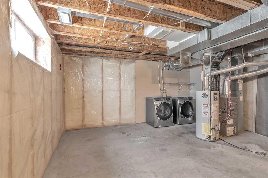 203 Cranberry Green Se, Calgary, AB - Indoor Photo Showing Basement