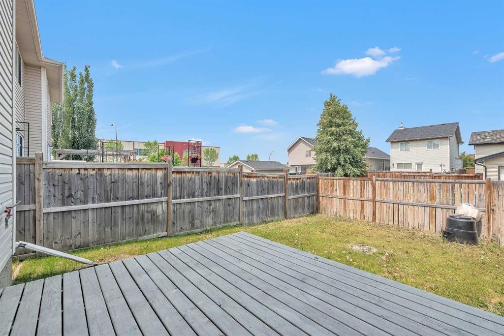 203 Cranberry Green Se, Calgary, AB - Outdoor With Deck Patio Veranda
