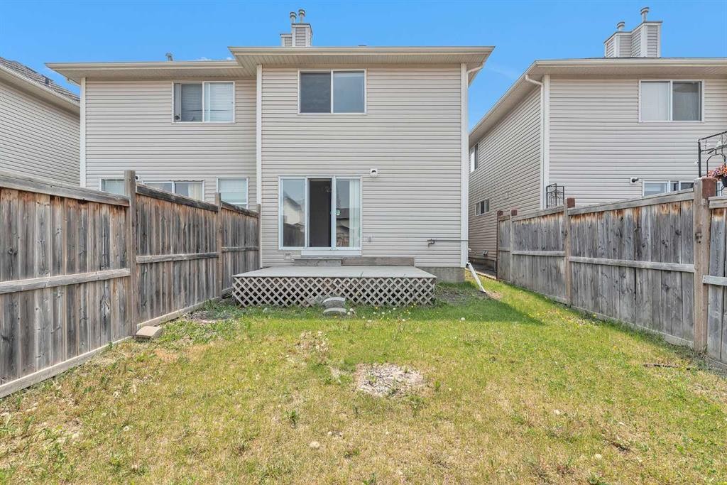 203 Cranberry Green Se, Calgary, AB - Outdoor With Deck Patio Veranda With Exterior