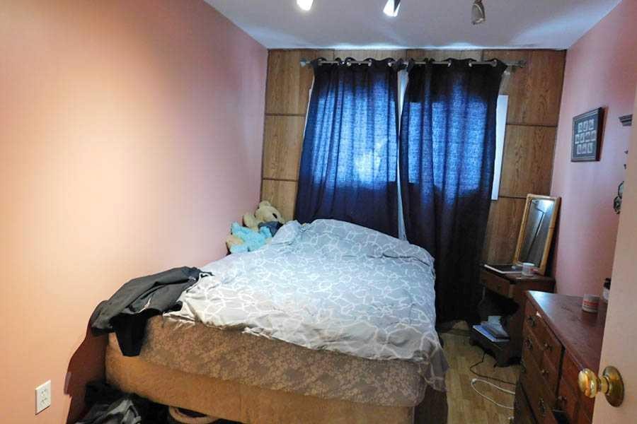 211 52 Avenue East, Claresholm, AB - Indoor Photo Showing Bedroom