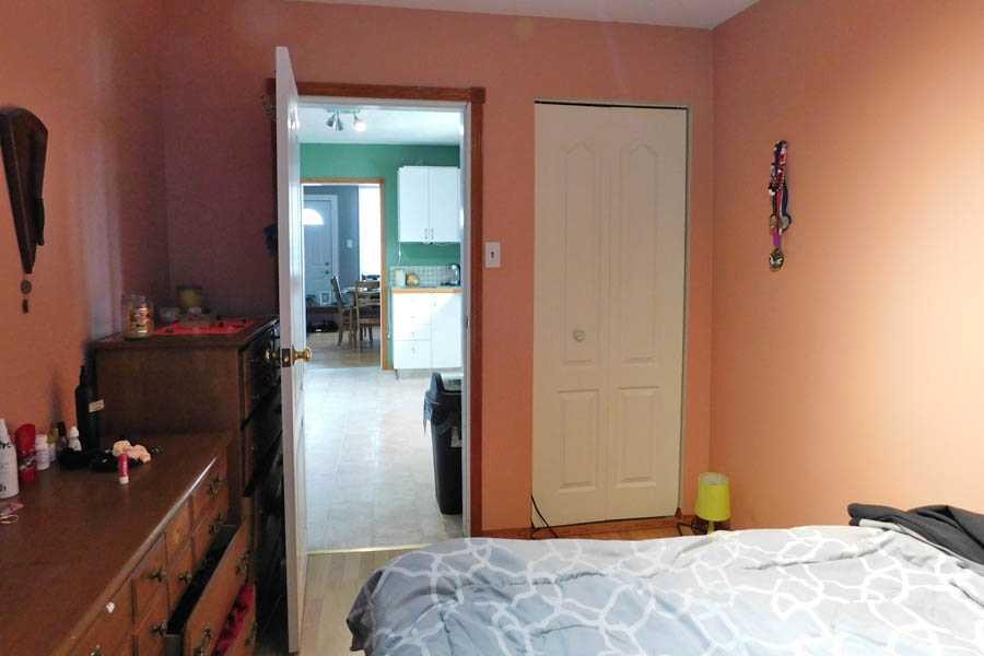 211 52 Avenue East, Claresholm, AB - Indoor Photo Showing Bedroom