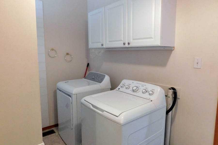 211 52 Avenue East, Claresholm, AB - Indoor Photo Showing Laundry Room