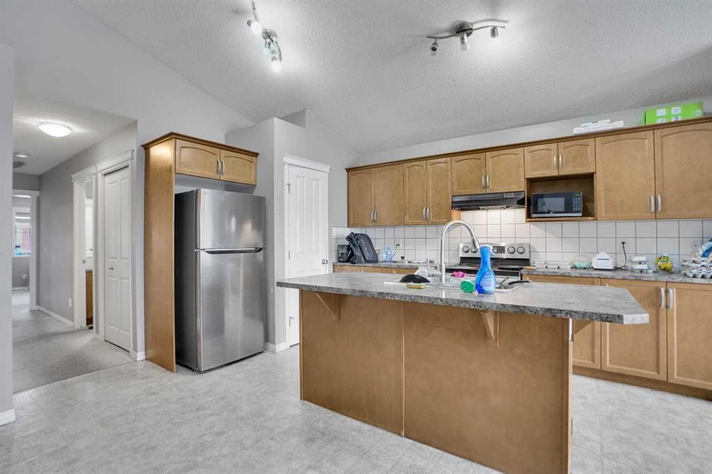 250 Martinwood Place Ne, Calgary, AB - Indoor Photo Showing Kitchen With Double Sink