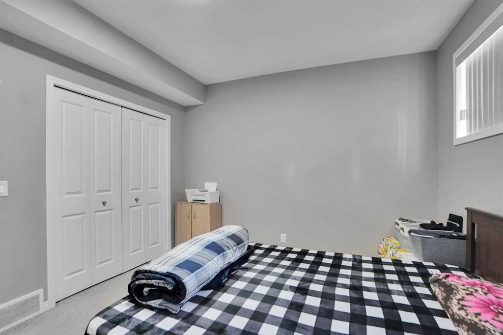 250 Martinwood Place Ne, Calgary, AB - Indoor Photo Showing Bedroom