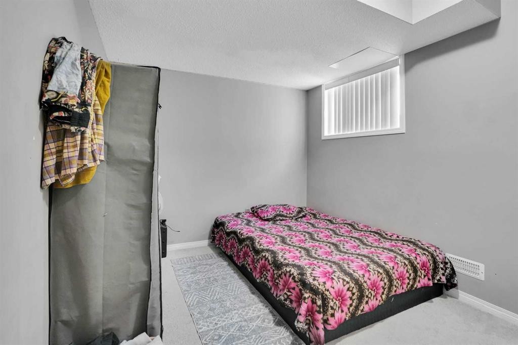 250 Martinwood Place Ne, Calgary, AB - Indoor Photo Showing Bedroom