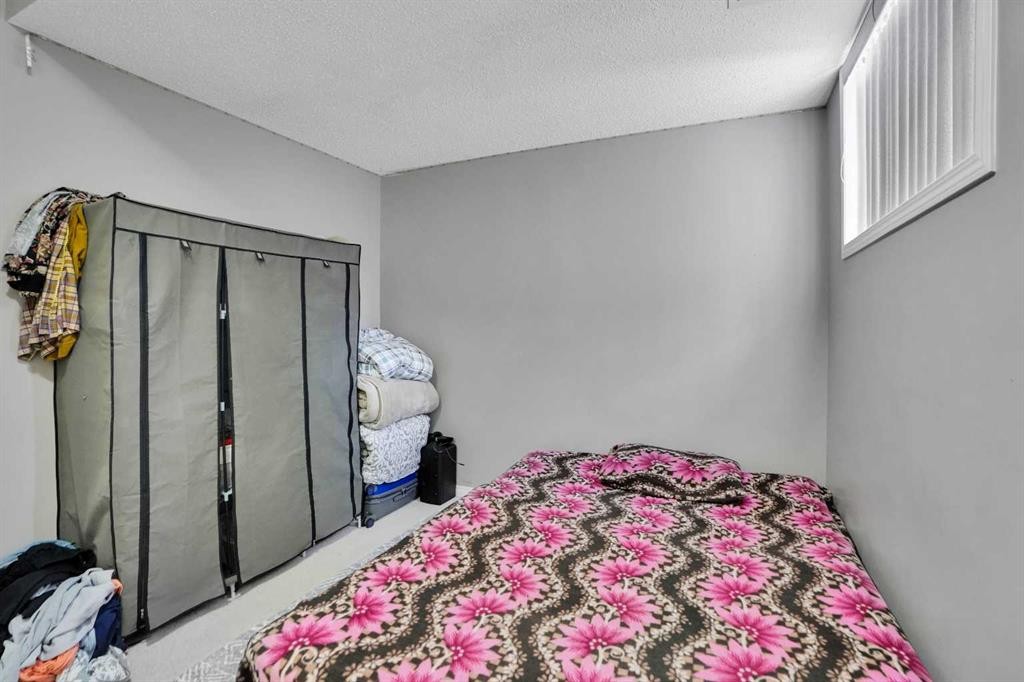 250 Martinwood Place Ne, Calgary, AB - Indoor Photo Showing Bedroom