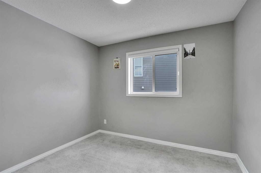 250 Martinwood Place Ne, Calgary, AB - Indoor Photo Showing Other Room