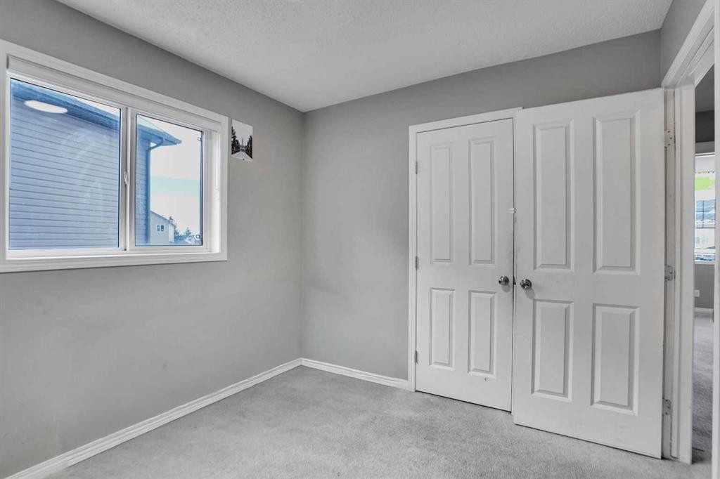 250 Martinwood Place Ne, Calgary, AB - Indoor Photo Showing Other Room