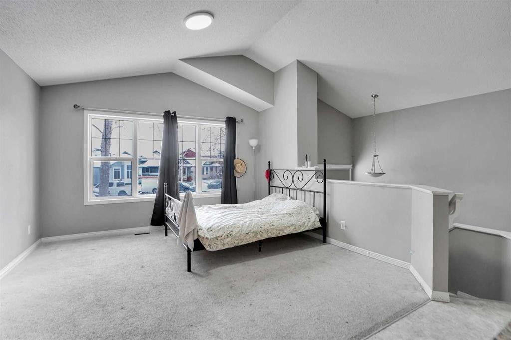 250 Martinwood Place Ne, Calgary, AB - Indoor Photo Showing Bedroom