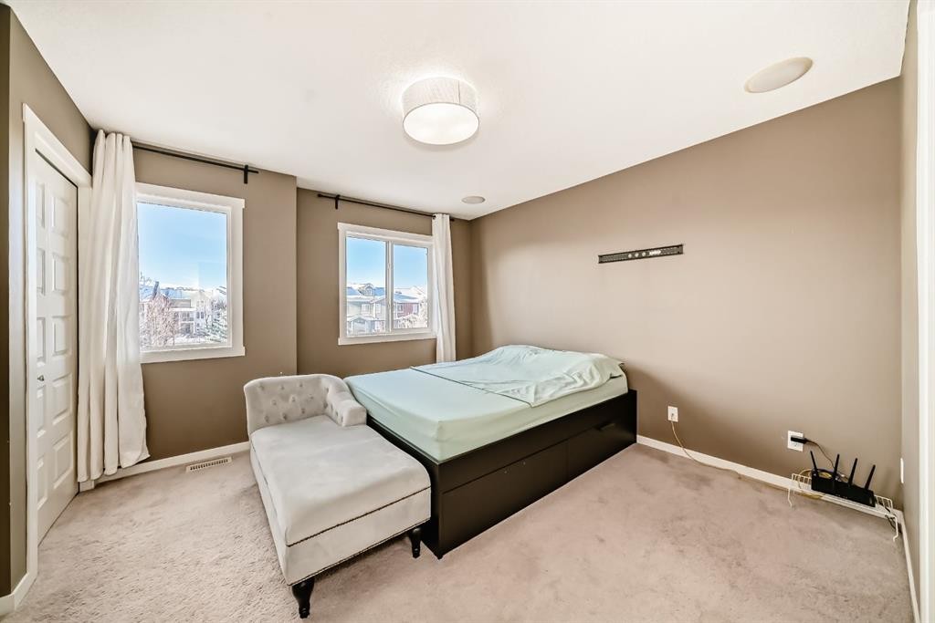 213 Auburn Bay Circle Se, Calgary, AB - Indoor Photo Showing Bedroom