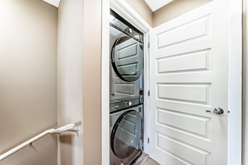 213 Auburn Bay Circle Se, Calgary, AB - Indoor Photo Showing Laundry Room
