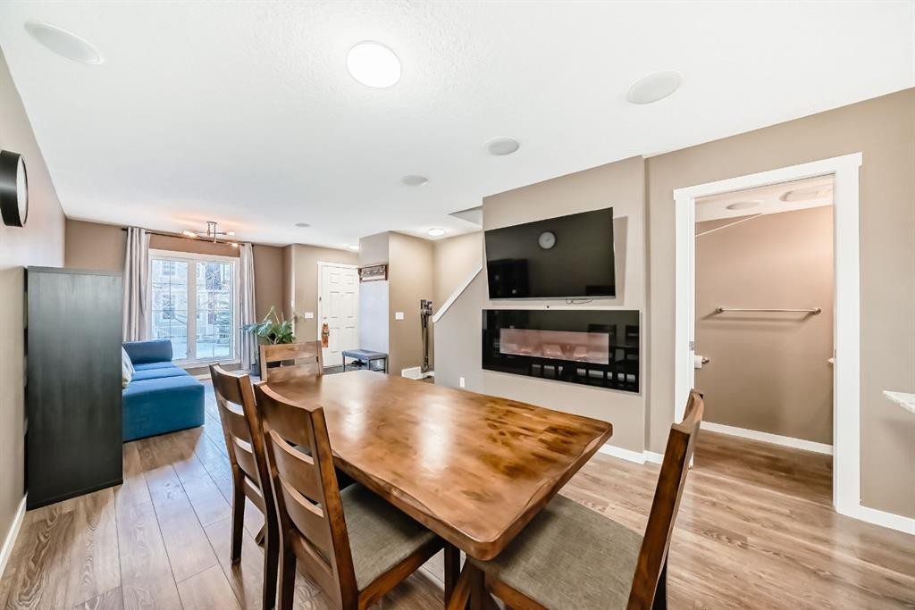 213 Auburn Bay Circle Se, Calgary, AB - Indoor Photo Showing Other Room With Fireplace