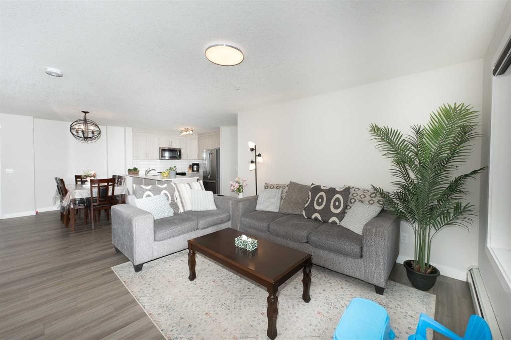 2104-6118 80 Avenue Ne, Calgary, AB - Indoor Photo Showing Living Room