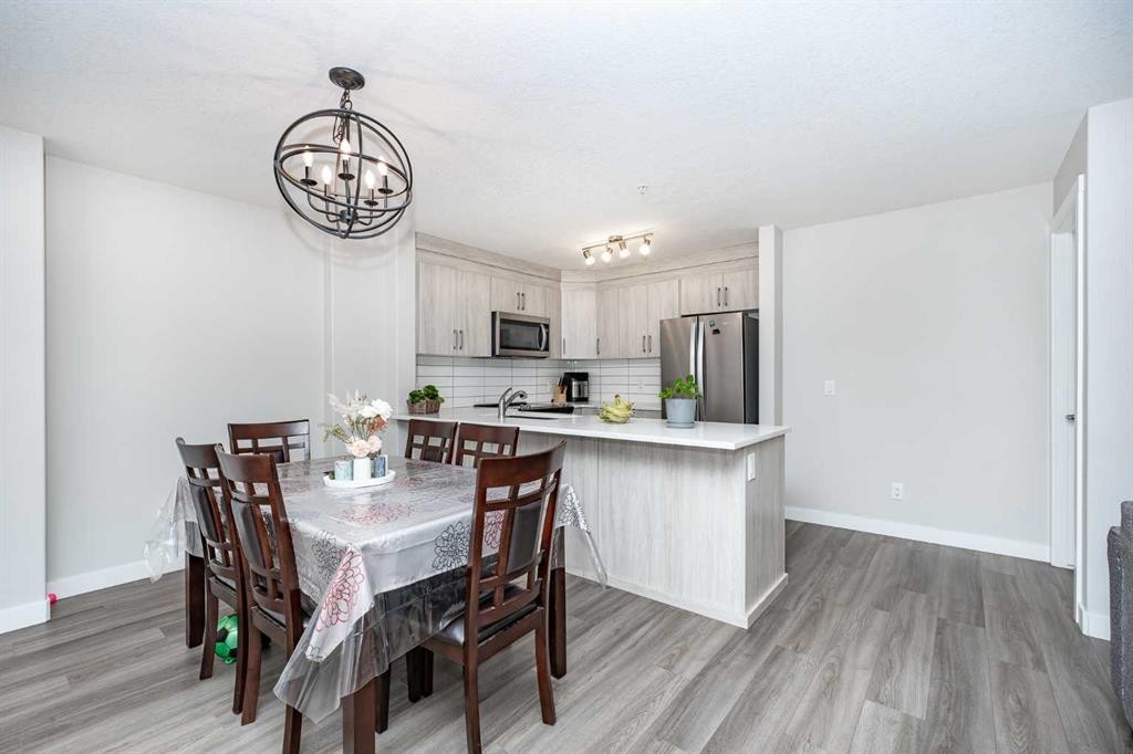 2104-6118 80 Avenue Ne, Calgary, AB - Indoor Photo Showing Dining Room