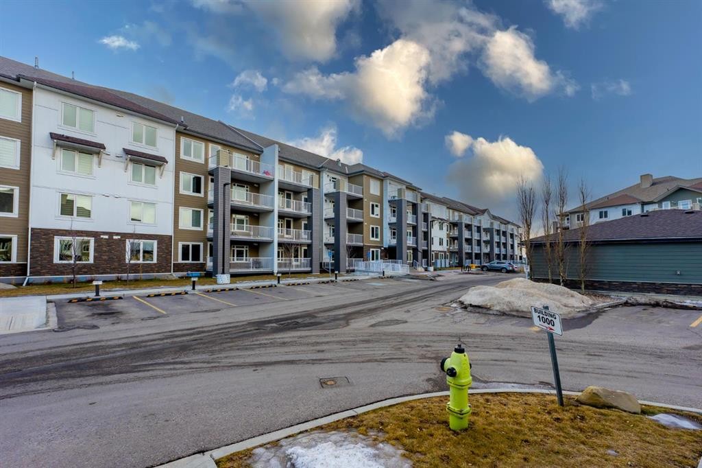 2104-6118 80 Avenue Ne, Calgary, AB - Outdoor With Balcony With Facade