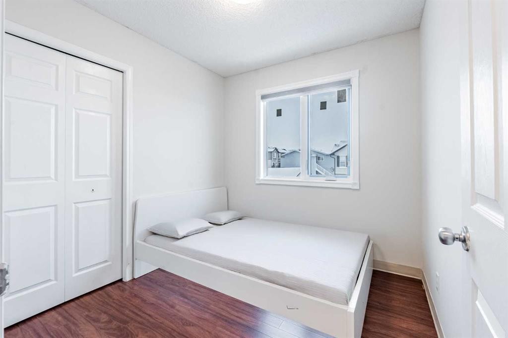 913 Taradale Drive Ne, Calgary, AB - Indoor Photo Showing Bedroom