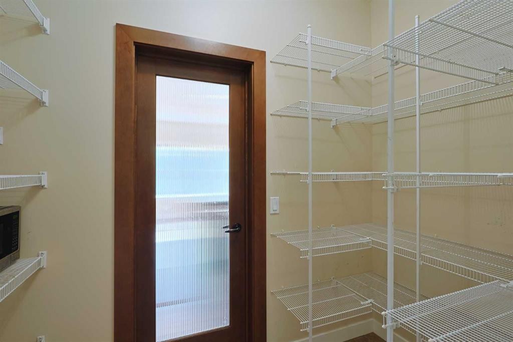 55 Tuscany Estates Drive Nw, Calgary, AB - Indoor With Storage