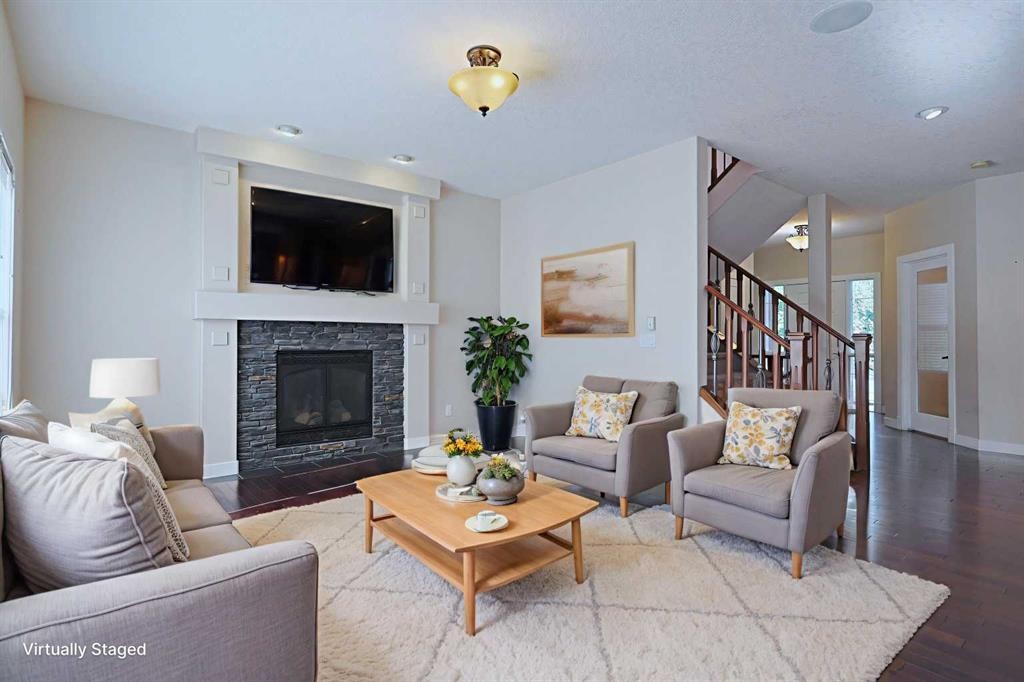 55 Tuscany Estates Drive Nw, Calgary, AB - Indoor Photo Showing Living Room With Fireplace