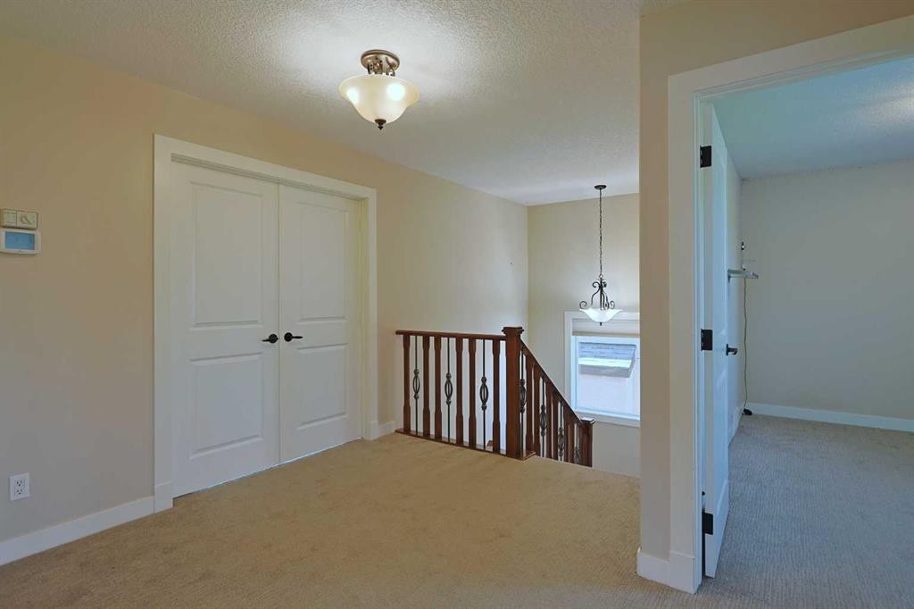 55 Tuscany Estates Drive Nw, Calgary, AB - Indoor Photo Showing Other Room