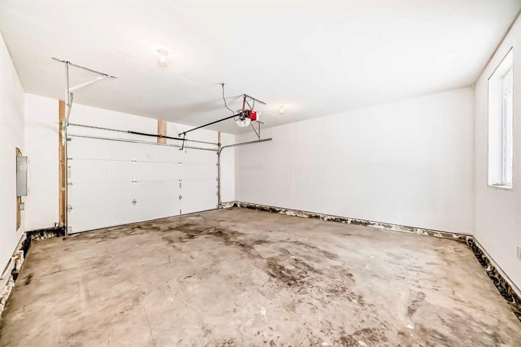 2006 37 Street Se, Calgary, AB - Indoor Photo Showing Garage