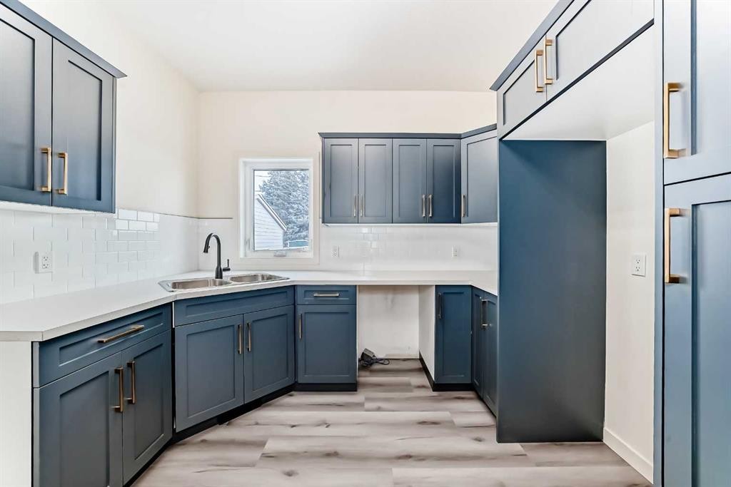 2006 37 Street Se, Calgary, AB - Indoor Photo Showing Kitchen With Double Sink