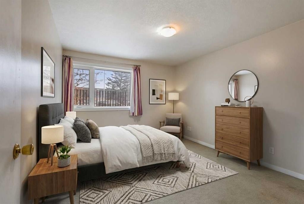 101-3747 42 Street Nw, Calgary, AB - Indoor Photo Showing Bedroom