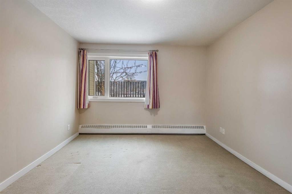 101-3747 42 Street Nw, Calgary, AB - Indoor Photo Showing Other Room